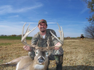 Shannon Banks with his 169" taken on one of his Kansas Whitetail Archery Hunts with Tall Tine Outfitters